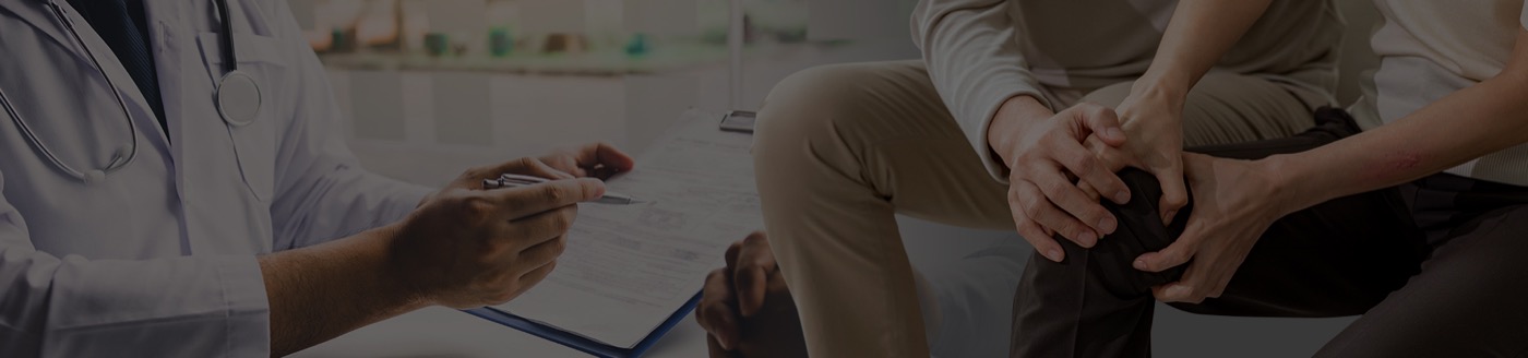 Doctor consulting patient about treatment